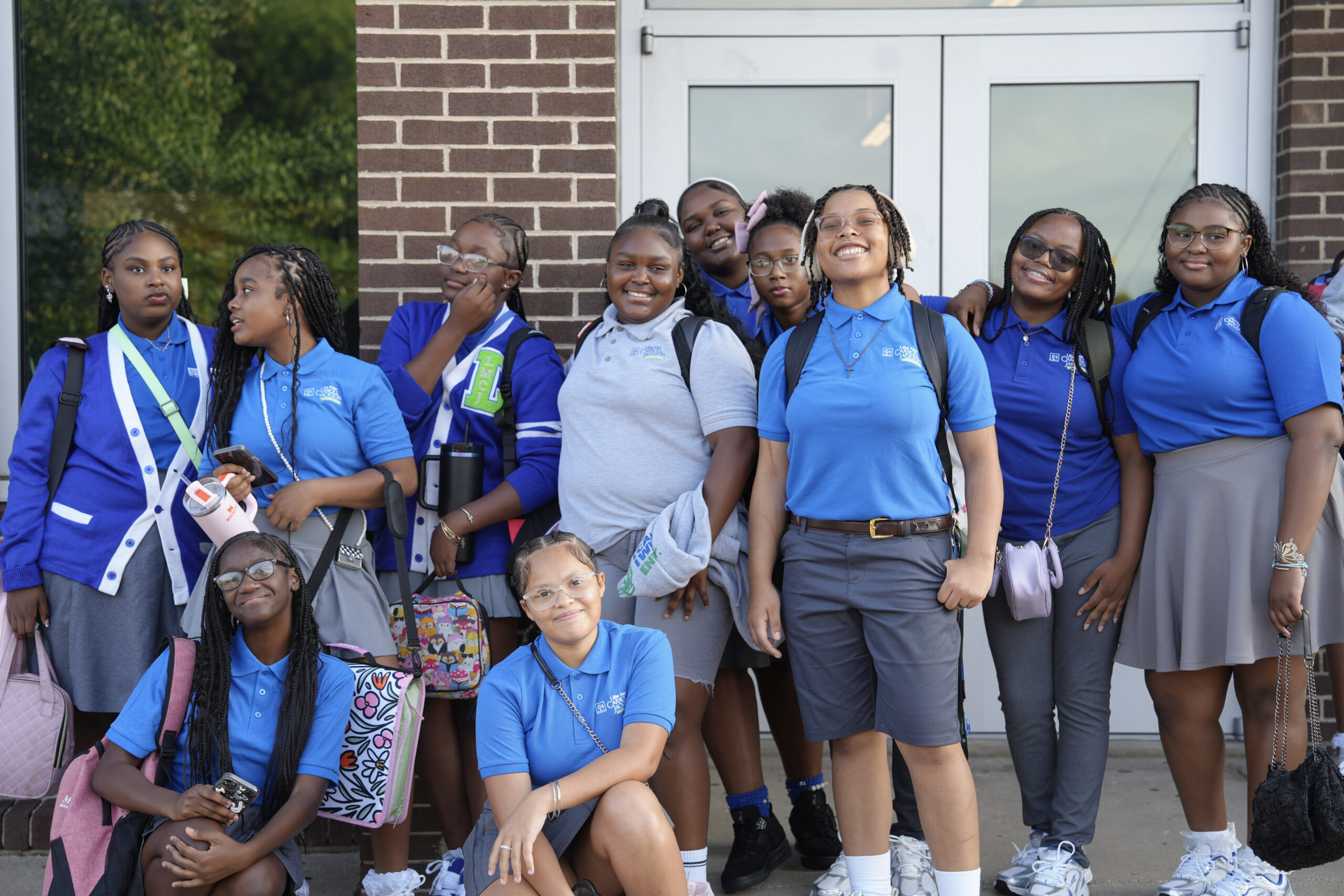 LMCJ scholars together outside their school